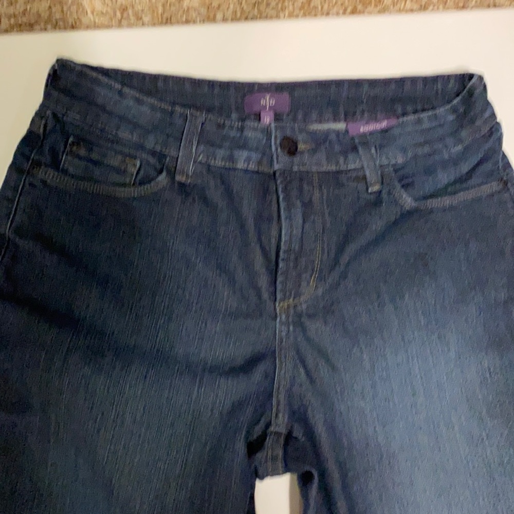 NYDJsize12x30 bootcut flowers on back pockets